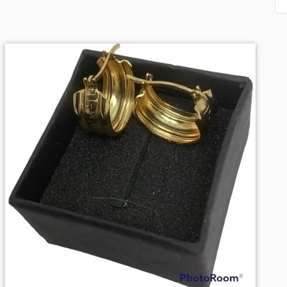 - Gold over sterling silver huggie earrings